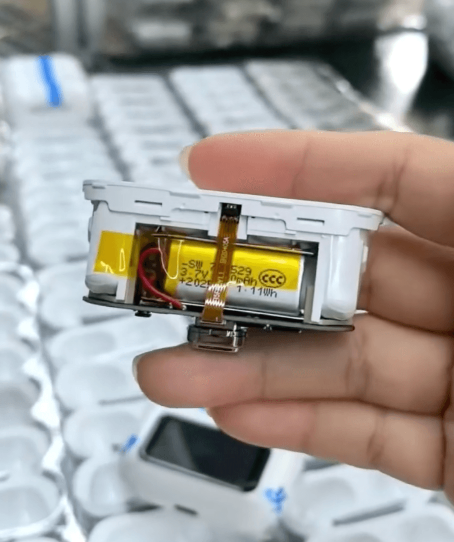 The internal structure of the headphones, including the battery and the mainboard